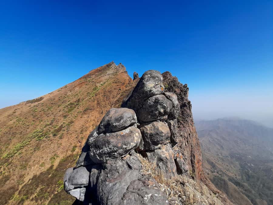 Santiago: Monte Tchota Natural Park to Pico d'Antónia Hike - Summit views toward Maio and Fogo